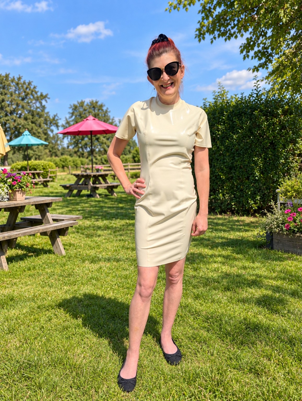 Julie in a cream dress outdoors
